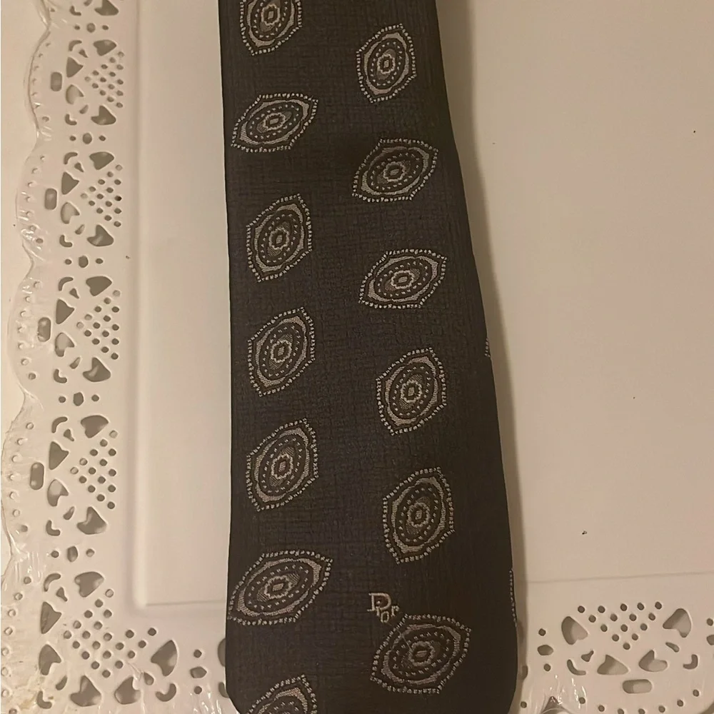 Christian Dior tie in like-new condition. Beautiful dark gray and cream tie